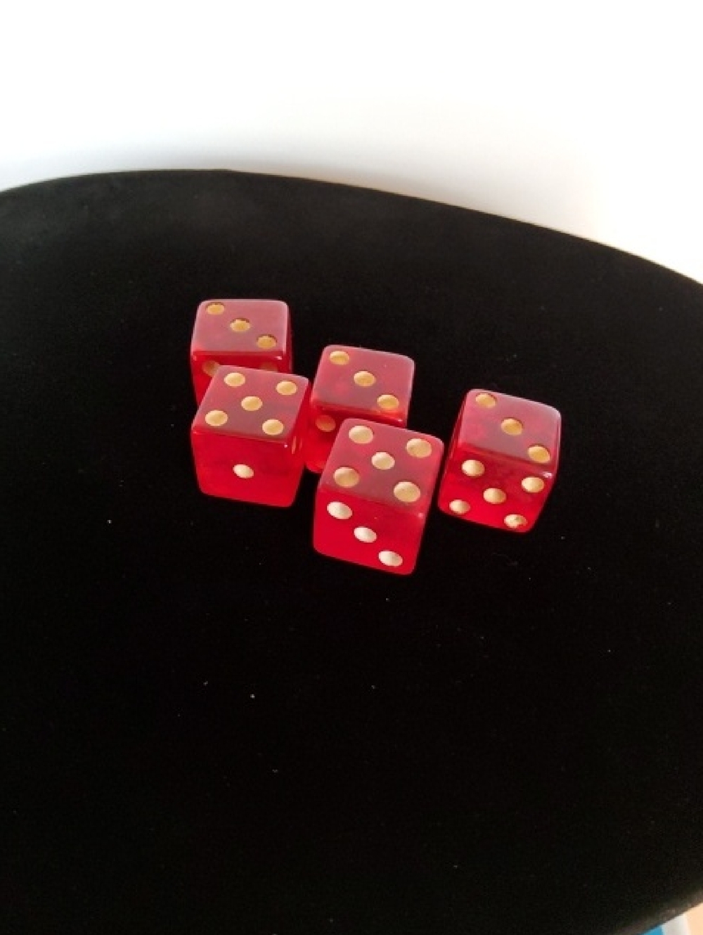 Old Translucent Cherry Bakelite Dice Set of Five.
